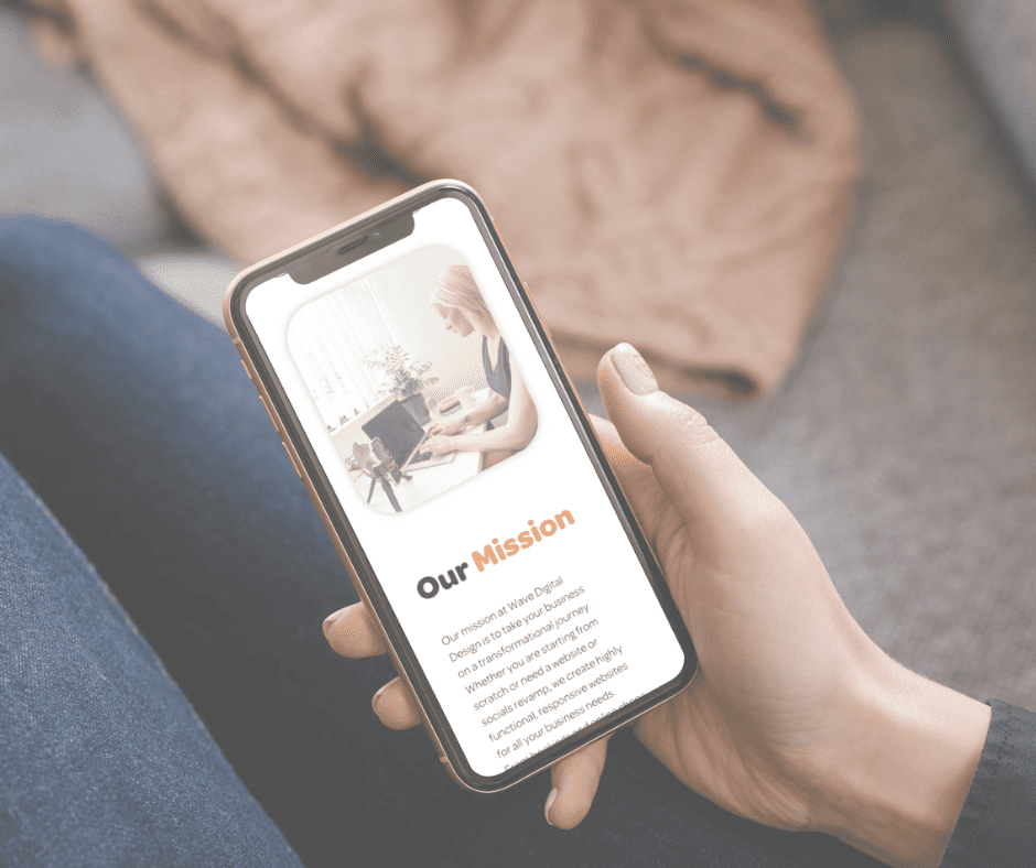 a woman holding an iphone displaying the word 'our mission' emphasizes the importance of our mission in providing exceptional hosting and maintenance services.